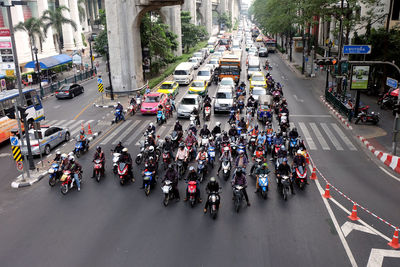 High angle view of vehicles on road in city