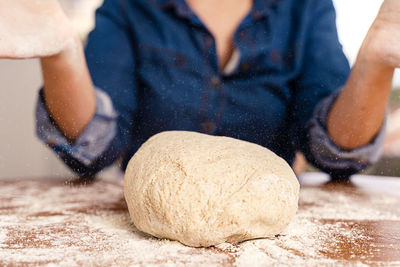 Close-up of man preparing food