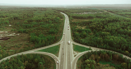 High angle view of highway amidst trees