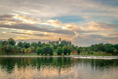 Scenic view of lake against sky during sunset