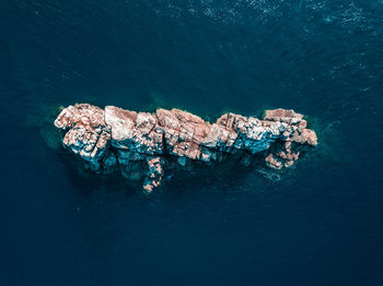 High angle view of sea and rocks