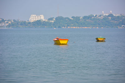 Boats in the upper lake at bhopal which is also known as 'city of lakes'.