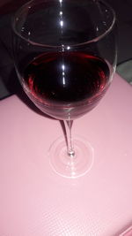 High angle view of wine glass on table