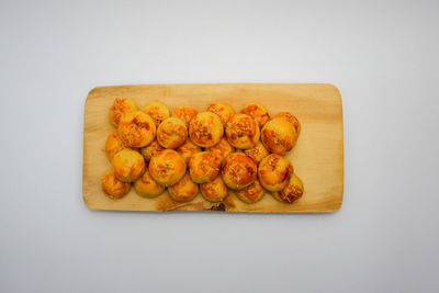 High angle view of bread on cutting board