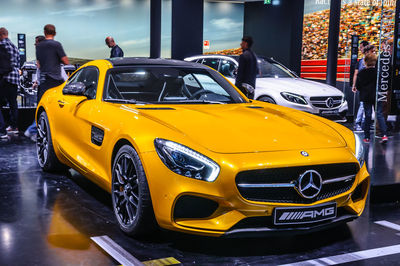 Yellow car on city street