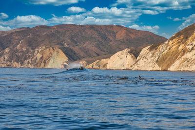 Scenic view of sea and mountains