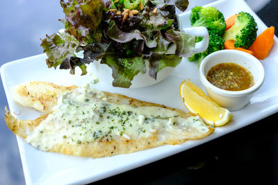 High angle view of serving food in plate
