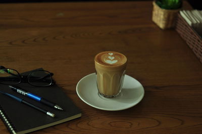 Close-up of coffee cup on table