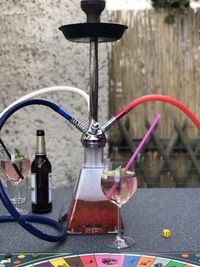 Close-up of wine bottles on table