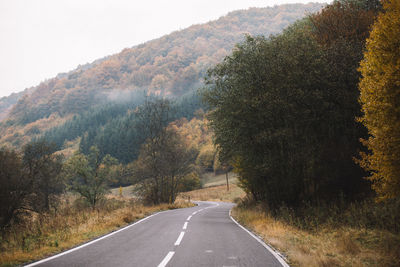 Road on mountain against sky