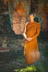 Full length of a man standing in temple