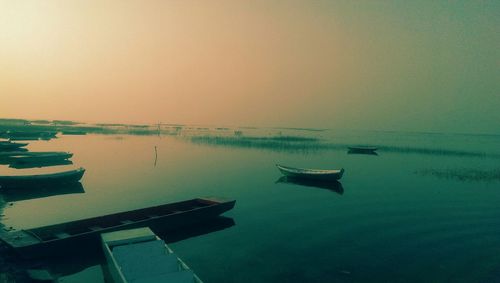 Scenic view of calm sea at sunset