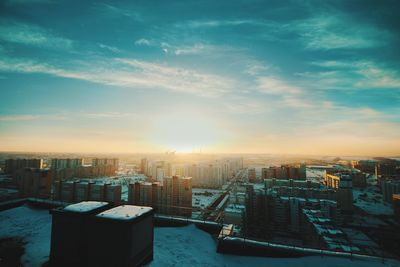View of cityscape against sky during sunset