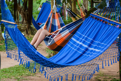 Person relaxing in hammock