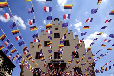 Low angle view of colorful flags