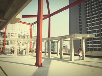 Woman standing in city