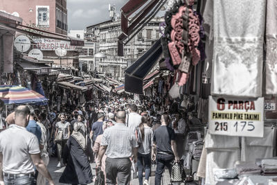 People walking on street in city