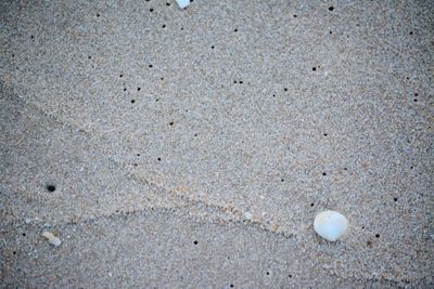 High angle view of stones on sand