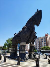 Statue of building against blue sky