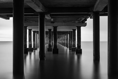 Underneath view of pier over sea