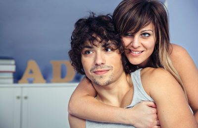 Portrait of a smiling young couple