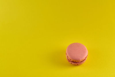 Close-up of dessert against yellow background