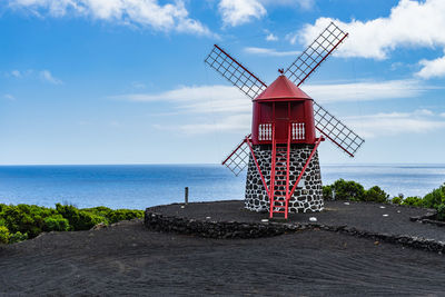 Red windmill in pico island, azores