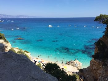 Scenic view of sea against blue sky