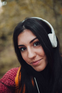 Close-up of young woman looking away