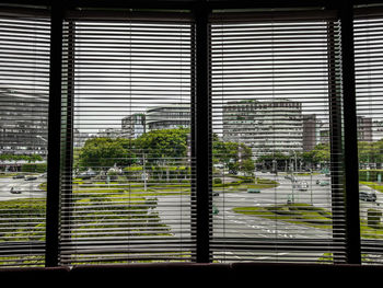 Buildings seen through glass window