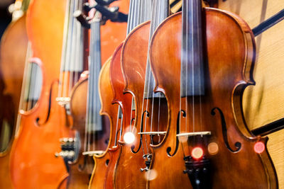 Close-up of violins for sale at shop