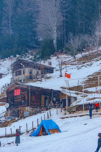 Scenic view of snow covered land
