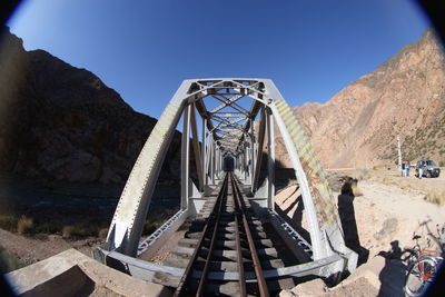 View of bridge against clear blue sky