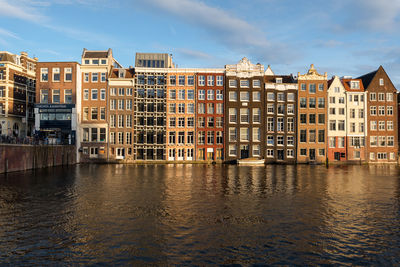 Buildings in city against sky