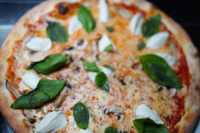 Close-up of pizza served in plate