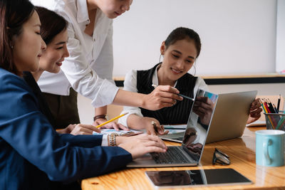 Business colleagues working at office