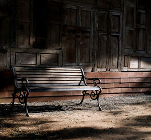 Empty bench in abandoned building