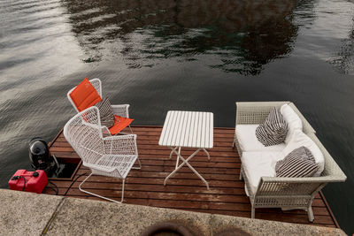 High angle view of sofa and chair on floating platform