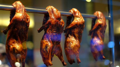 Close-up of meat on barbecue grill