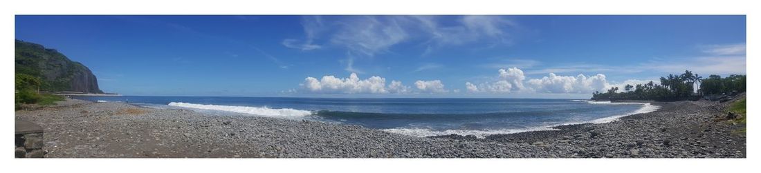 Panoramic view of beach against sky