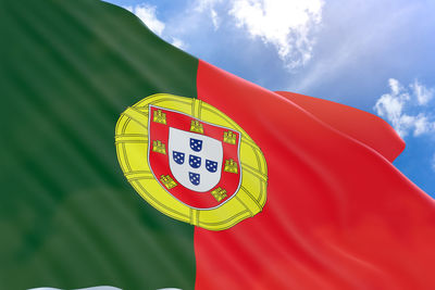 Low angle view of flag against sky