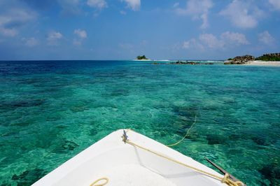 Scenic view of turquoise sea against sky