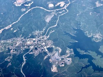 High angle view of aerial shot of sea and landscape