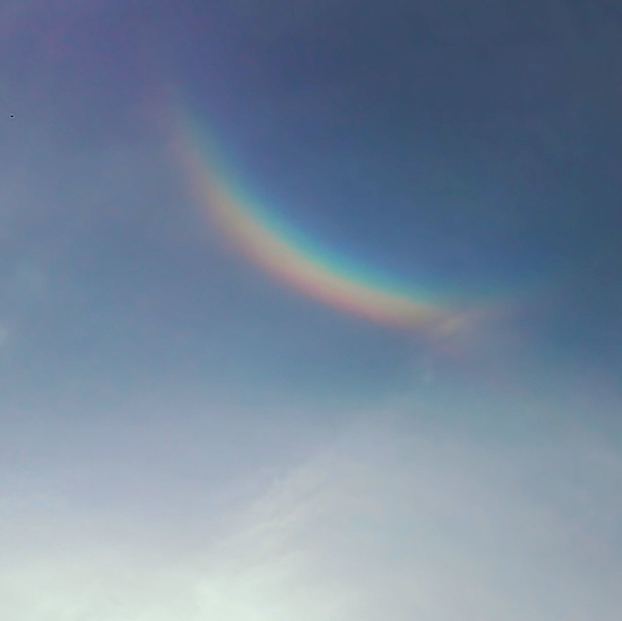 beauty in nature, scenics, low angle view, tranquility, blue, tranquil scene, backgrounds, sky, idyllic, nature, majestic, full frame, sky only, cloud, rainbow, cloudscape, vibrant color, meteorology, heaven, outdoors, day, multi colored, cloud - sky, bright, no people, dreamlike