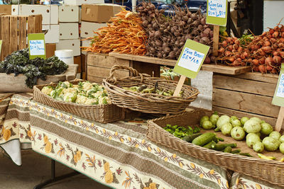 Display of carrots, beetroot and other vegetables for sale at a farmers market in boulder, colorado 