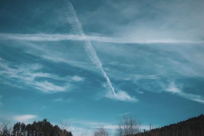 Low angle view of vapor trail in sky