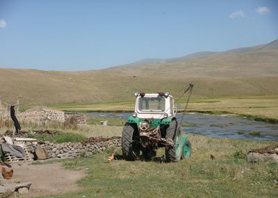 Tractor on agricultural landscape