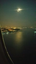 Aerial view of illuminated cityscape at night