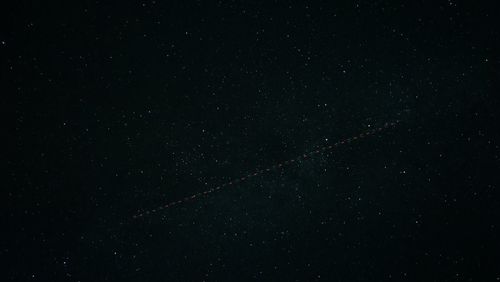 Low angle view of vapor trails in sky