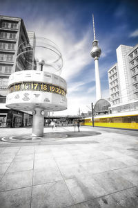 View of communications tower in city